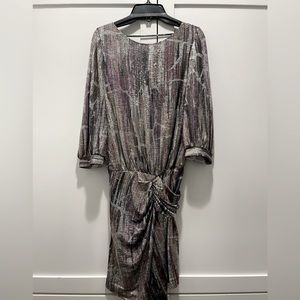 Gorgeous, sexy, low back dress. Perfect for the holidays or a fun night out!